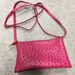 Pink cross body or wristlet